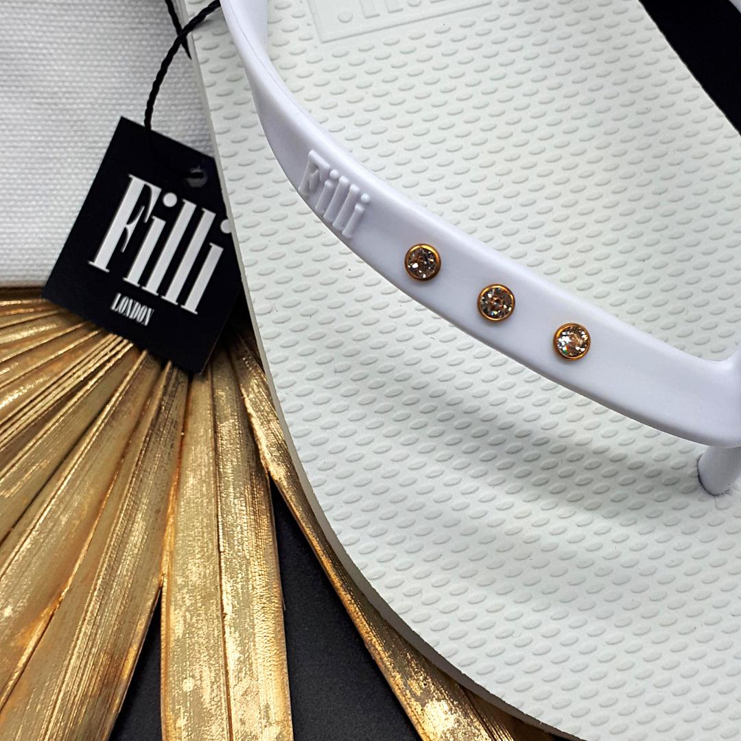 Filli London St Tropez Crystal Flip Flops in White, featuring Swarovski® crystals and a stylish design.